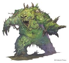 an image of a creature that is green and has sharp fangs on its face,