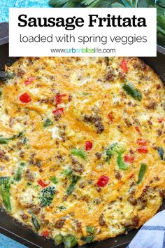 sausage frittata loaded with spring veggies in a cast iron skillet