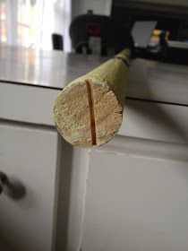 a piece of wood sticking out of the side of a cabinet