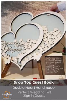 two heart shaped paper cutouts with the words drop top guest book