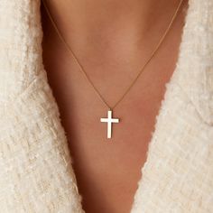 This 14k plain gold dangling cross necklace is a simple yet stunning accessory that will add a touch of sophistication to any outfit. The delicate gold chain holds a beautifully crafted cross charm that dances elegantly with every movement. Measuring approximately 18mm in size, this necklace is the perfect size for everyday wear, and the 14k gold construction ensures that it will last for years to come. ▶  Features * Made to Order. * Gold KT: 14K Solid Gold * Custom Gold Color: Rose Gold, Yellow Gold, White Gold * Cross: 18 x 11 MM * Ready to Ship in 3-5 Business Days ▶ See more of our Gold Necklaces here - http://etsy.me/2lUxj86 ▶ See our storefront here - http://etsy.me/2lUcVnH  ▶ All store sections here * Diamond Rings - http://etsy.me/2lwKUl8 * Diamond Earrings - http://etsy.me/2lyqVBP Minimalist Yellow Gold Cross Necklace With Clavicle Chain, Minimalist Yellow Gold Cross Pendant Necklace, Minimalist 14k Gold Crucifix Necklace, Everyday 14k Gold Cross Pendant Necklace, Everyday 14k Gold Cross Necklace, Daily 14k Gold Cross Pendant Necklace, Minimalist 14k Gold Crucifix Cross Necklace, Cross Charm Necklace, Simple Cross