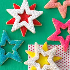 some cookies are on a green and white background with the words cutout christmas cookies