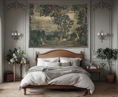 a large tapestry hanging over a bed in a bedroom