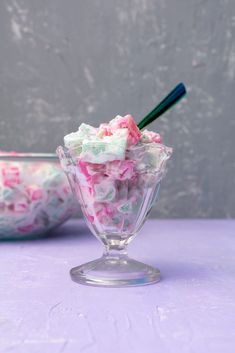 a glass bowl filled with food and the words vegan potato salad