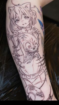 a person with a tattoo on their arm and leg that has an anime character drawn on it