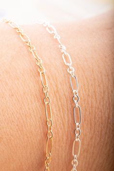 Long and Short Chain by Foot, Great for Permanent Jewelry, Bracelets 5mm x 4mm Metal Choices available: sterling silver and gold filled Choose from 3, 5, 10, 15, 20 and 25 feet Check out our chains section: https://www.etsy.com/shop/MilanPersonalized?ref=seller-platform-mcnav&section_id=39974974 Check out our connector charms section: https://www.etsy.com/shop/MilanPersonalized?ref=seller-platform-mcnav&section_id=39975070 Check out our birthstone connectors section: https://www.etsy.com/shop/Mi Dainty Sterling Silver Link Bracelet, Minimalist Silver Bracelet With Figaro Chain, Minimalist Silver Figaro Chain Bracelet, Dainty Sterling Silver Link Chain Bracelet, Silver Link Bracelet With Delicate Chain, Silver Bracelets With Delicate Oval Link Chain, Silver Dainty Chain Link Bracelet, Dainty Silver Chain Bracelet With Lobster Clasp, Silver Dainty Oval Link Chain Bracelet