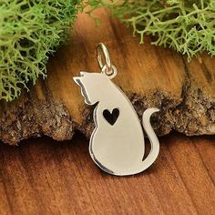 No matter the age, the young lady in your life is sure to love this adorable Solid .925 Sterling Silver Cat charm as it dazzles and shines with every movement she makes! This fun and whimsical Cat Charm is 100% Solid 925 Sterling Silver and measures 20mm, which is less than 1 inch. It has a 5mm soldered jump ring attached. Just slide right on to a Sterling Silver chain to make a completed Cat necklace. Silver Cat Pendant, Cat Necklace Silver, Cat Pendant Necklace, Pet Memorial Jewelry, Mommy And Baby, White Jewelry Box, Sterling Silver Cat, Baby Cat, Silver Cat