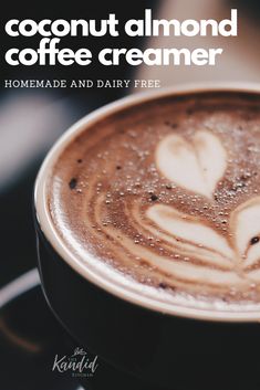 there is a cup of coffee with hearts on it and the words coconut almond coffee creamer