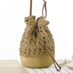 Brown Woven Side Bucket Bag for $41.99 | Baginning Small Shoulder Bags, Drawstring Bucket Bag, Rattan Bag, Lv Bags, Crossbody Clutch, Bag Trends, Bag Light, Woven Bag, Knitted Bags