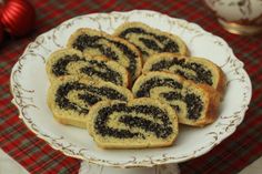 several slices of bread on a plate with christmas decorations in the backgroung