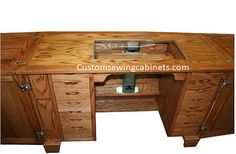 a wooden desk with drawers on it