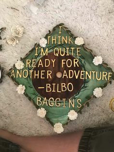 a graduation cap with the words i think i'm quite ready for another adventure