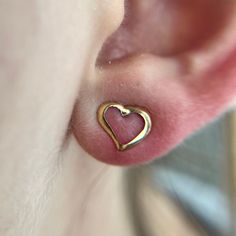 Super cute solid 14k gold heart shaped earrings measuring 8mm N-S x 9.5mm E-W. Only made it with one original back, but I'll include a regular back for wear. Darling earrings!  Marked and tested 14k  Weighs .3g Heart Shaped Earrings, Heart Frame, May 22, Gold Heart, Heart Of Gold, Made It, Heart Shapes, Super Cute, Stud Earrings