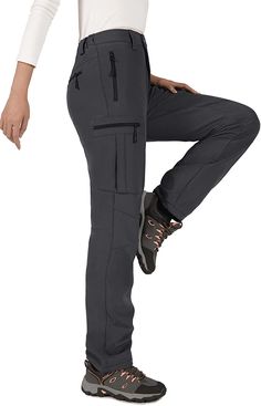 95% Polyester, 5% Spandex Imported Zipper closure Machine Wash [4 Deep Zipper Pockets] Our women winter hiking pants with 2 front zipper pockets, 1 leg zipper pocket and hip zipper pocket, it is safe and convenient to storge your necessaries. [Adjustable Waist & Belt Loops] These womens softshell pants adopts elastic waistband and belt loops, slim fit for your body. [Warm, Windproof but Not Bulky] Cycorld women ski pants with inner polar fleece, will not bulky but keeps you always nice and warm Winter Hiking Pants, Cold Weather Pants, Ski Pants Women, Women Ski, Waterproof Pants, Winter Pants, Travel Outfits, Winter Hiking, Outdoor Pants