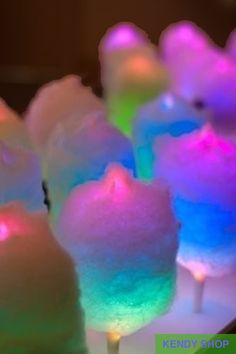 there are many marshmallows with colored lights on them