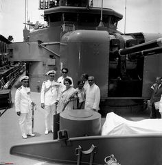 black and white photograph of sailors on deck of ship