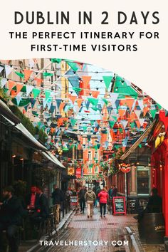 people walking down the street in dublin with text overlay that reads dublin 2 days the perfect itinerary for first - time visitors