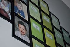 several pictures are hanging on the wall with green and yellow squares around them, along with black frames