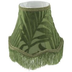 a green lamp shade with fringes and leaves on the bottom, hanging from a ceiling fixture