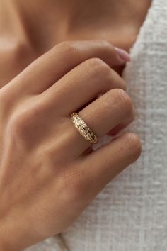 Snakeskin Dome 14k Gold Ring, Snake Croissant Ring, Dome Band Ring, Real Gold Jewellery, Serpent Ring, Great Gift For Her, Statement Ring Material: Solid Gold Karat: 14 K (585) Weight: 2.65 gr Height of the top: 2.3 mm Available in yellow gold, rose gold or white gold options Want to Check Out More from Our Sections FİEMMA http://www.etsy.me/3ukWhje Gold Rings http://www.etsy.me/39E9NGS Gold Necklaces http://www.etsy.me/31NdjtO Gold Bracelets http://www.etsy.me/2QT9SzF Gold Earrings http://www.etsy.me/3mfSmRK Gold Pendants http://www.etsy.me/3uiXrLZ Gold Chains http://www.etsy.me/2PzqkVB Wholesale requests are welcome. **Please see our policies section for shipping and return information. Feel free to contact me with any questions or request Elegant Hammered Wide Ring For Promise, Elegant 14k Gold Hammered Wide Band Ring, Tarnish Resistant Yellow Gold Wide Band Promise Ring, Anniversary Rings With Diamond Cut In Recycled Gold, Anniversary Recycled Gold Rings With Diamond Cut, Anniversary Diamond Cut Ring In Recycled Gold, Anniversary Diamond Cut Recycled Gold Rings, Heirloom Wedding Jewelry Tarnish Resistant, Heirloom Tarnish-resistant Wedding Jewelry