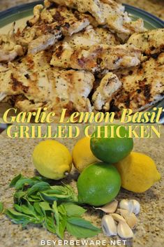 garlic lemon basil grilled chicken on a plate with lemons and cashews