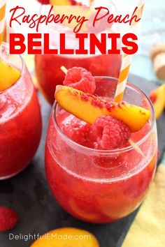 raspberry peach bellinis in glasses with strawberries