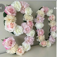 flowers arranged in the shape of the word love