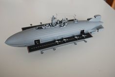 a toy model of a battleship on a table