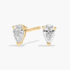 Sparkle with every movement of your head when you wear these classic stud earrings set with pear-cut diamonds. The 14k yellow gold design promises a cool lustre that beautifully matches the stones. Pear Cut Diamond, Diamond Stud Earrings, Blue Nile, Diamond Stud, Stud Earrings Set, Pear Cut, Gold Design, Diamond Earrings Studs, Diamond Studs