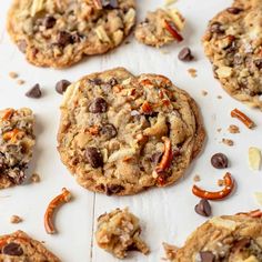 chocolate chip cookies with pecans scattered around them