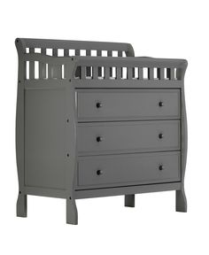 a gray crib bed with drawers on the bottom and side rails, in front of a white background