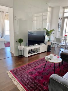 the living room is clean and ready to be used as a home theater or entertainment center