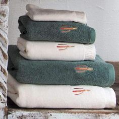 four towels stacked on top of each other