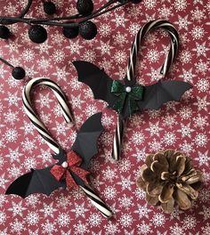 some candy canes and decorations on a table