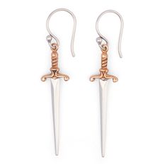 PRICES MAY VARY. Detailed Dagger Design: These mixed metal mini dagger dangle earrings, measuring 38x10mm, boast intricate details from point to pommel, capturing the fierce essence of a true dagger. Versatile Everyday Accessory: These sterling silver earrings are ideal for both daily wear and any magical occasion, effortlessly enhancing any outfit with a unique and fierce charm. 925 Sterling Silver: Made from 925 sterling silver, these earrings combine durability with environmental sustainabili Dagger Design, Knife Earrings, Dagger Earrings, Mixed Metal Earrings, Everyday Accessories, Small Earrings, Metal Earrings, Silver Earrings Dangle, Mixed Metals