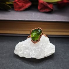 This Chunky Arizona Peridot Ring in size 6.5 is a playful addition to any jewelry collection. The bright green peridot stone add a pop of color, while the copper base adds a touch of quirkiness. Perfect for those who don't take themselves too seriously. August Birthstone Ring, Copper Crystal, Electroformed Jewelry, Peridot Stone, August Birthstone, Peridot Ring, Bubble Mailer, Green Peridot, Crystal Ring