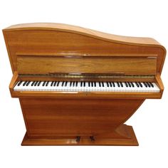 a wooden piano with a white background