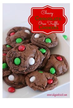 chocolate m & m cookie cookies on a white plate with green and red candies