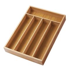 an empty wooden tray with compartments on it