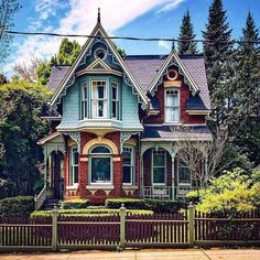 an old victorian style house in the suburbs