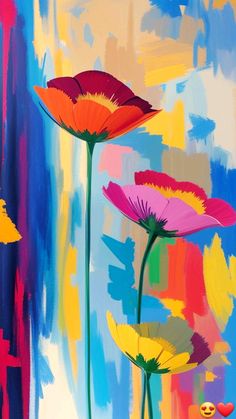 three colorful flowers are in front of a painting