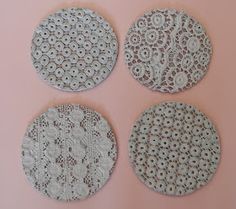 four lace doily on a pink background