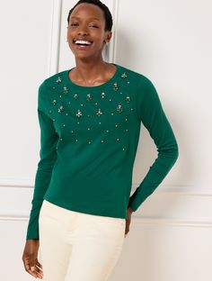 Gorgeous embellishments shimmer on this long sleeve t-shirt. Crafted from soft cotton with an easy crewneck. Features Tee Shirt Long Sleeve Hits At Hip Crew Neck Straight hem Imported Fit: Misses: 25 1/2"; Petite: 24 1/2"; Plus: 28"; Plus Petite: 26" Material: 100% Cotton Care: Machine Wash Cold; Only Non-Chlorine Bleach When Needed; Turn Garment Inside Out; Warm Iron On Reverse; Reshape, Lay Flat To Dry; Do Not Iron Decoration Or Trim | Embellished Crewneck T-Shirt - 100% Cotton Talbots Classic Style Women, Family Event, Long Sleeve Tee Shirts, Color Crush, Winter Blues, Sweater Shop, Fall Wardrobe, Long Sleeve Tshirt, Stylish Outfits