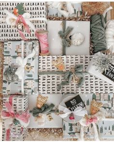 many different items are arranged together on the table and in front of them is a christmas card