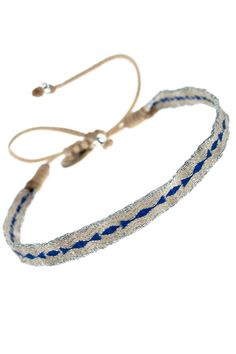 a blue and white braided bracelet with silver beads on an adjustable cord, against a white background