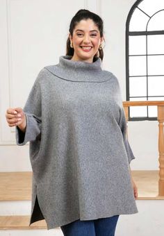 Introducing "Rachel's Sweater Tunic," a cozy and chic addition to your wardrobe. Crafted with a relaxed and forgiving fit, this sweater tunic offers both comfort and style for any occasion. Featuring splits on each side, "Rachel's Sweater Tunic" provides freedom of movement and adds a modern flair to the silhouette. The 3/4 cuffed rib sleeves offer a casual yet refined look, perfect for everyday wear. Complete with a ribbed turtleneck, this tunic provides warmth and texture, ensuring you stay co