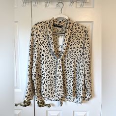 Zara Satin Animal Print Blouse Size S Never Worn Before With Tags. String Ties In Front. Front Hidden Button Closure. Cream Long Sleeve Printed Top, Long Sleeve Printed Cream Tops, Cream Collared Blouse For Day Out, Zara Beige Button-up Blouse, Spring Leopard Print Workwear Blouse, Elegant Leopard Print Blouse For Spring, Zara Cream Long Sleeve Blouse, Elegant Leopard Print Blouse For Summer, Zara Cream Blouse For Day Out