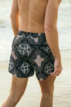 Designed for ultimate comfort and style, the Hudson swim trunks feature an elastic waistband, ensuring a perfect fit every time. The mesh interior and drawstrings add extra convenience and flexibility, allowing you to adjust the trunks to your preference. Plus, the addition of the zipper back pocket provides a handy storage space for anything you need to stash at the beach, from keys to sunscreen  These swim shorts are part of a his and hers matching swim set. While she wears Harper in Renaissance Print you'll be by her side in the Hudson in Renaissance Print Swim Trunks. A part of Summer 2024 Miami Swim Week Collection: Seaside. Exclusive to Ivy Swimwear. Hand wash in cold water and lay flat to air dry  80% nylon and 20% spandex Black Relaxed Fit Swim Trunks For Beachwear, Black Swim Trunks With Functional Drawstring For Summer, Summer Black Swimwear With Functional Drawstring, Black Swimwear With Functional Drawstring For Summer, Black Swim Trunks With Elastic Waistband For Poolside, Beachwear Swim Trunks With Elastic Waistband, Vacation Beachwear Swim Trunks With Drawstring, Beach Black Swim Trunks With Elastic Waistband, Black Swim Trunks With Elastic Waistband For Beach