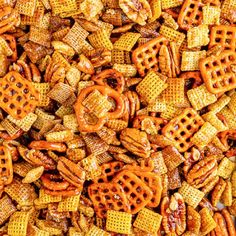 many different types of waffles and pretzels are arranged in a pile