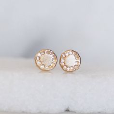 14k yellow gold Wildflower earrings on your choice of either 14k gold posts OR Sterling Silver posts. Handmade rounded gold discs hammered with a pattern reminiscent of a wildflower. Classic and modern, these are a little bit of luxury you can wear every day. Earrings are about 5.5-6mm's in diameter Posts ad ear backs - Choose between 14k gold or Sterling silver ear backs (the flower on both is 14k gold) Gold and Silver - Eco Friendly, Recycled Finish - Pictured with brushed finish, but can also Gold 14k Diamond Earrings Gift, Delicate 14k Gold Round Diamond Earrings, 14k Yellow Gold Round Cluster Earrings, Gold Sterling Silver Cluster Earrings For Anniversary, Gold Cluster Earrings In Sterling Silver For Anniversary, Gold Cluster Earrings In 14k Gold, Yellow Gold Sterling Silver Cluster Earrings, Delicate Gold Diamond Earrings For Everyday, Delicate Gold Cluster Earrings For Anniversary